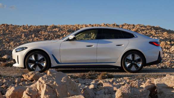 BMW i4 eDrive40 G26 2021 Mineral White side view off-road